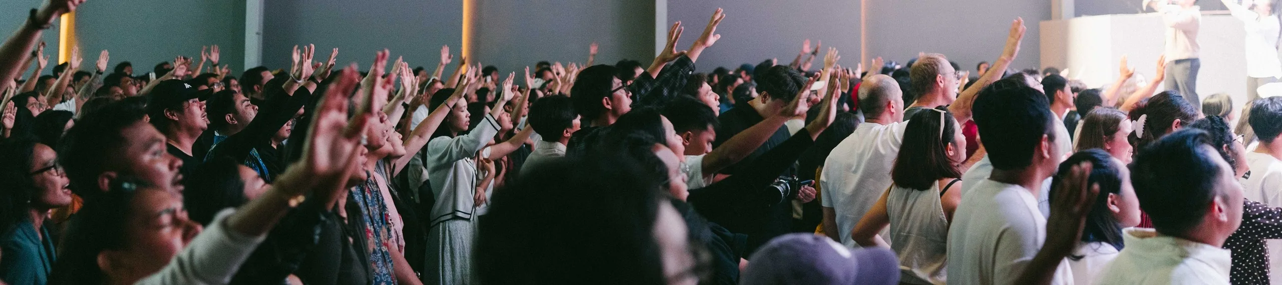 Congregation worshipping together at a Hillsong Bali service